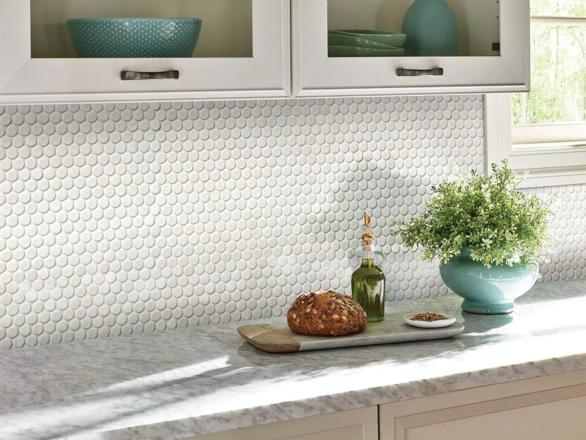 White Glossy Penny Round Mosaic Porcelain in a finished room