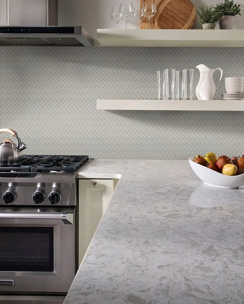 Gray Glossy Herringbone Mosaic Porcelain in a finished room