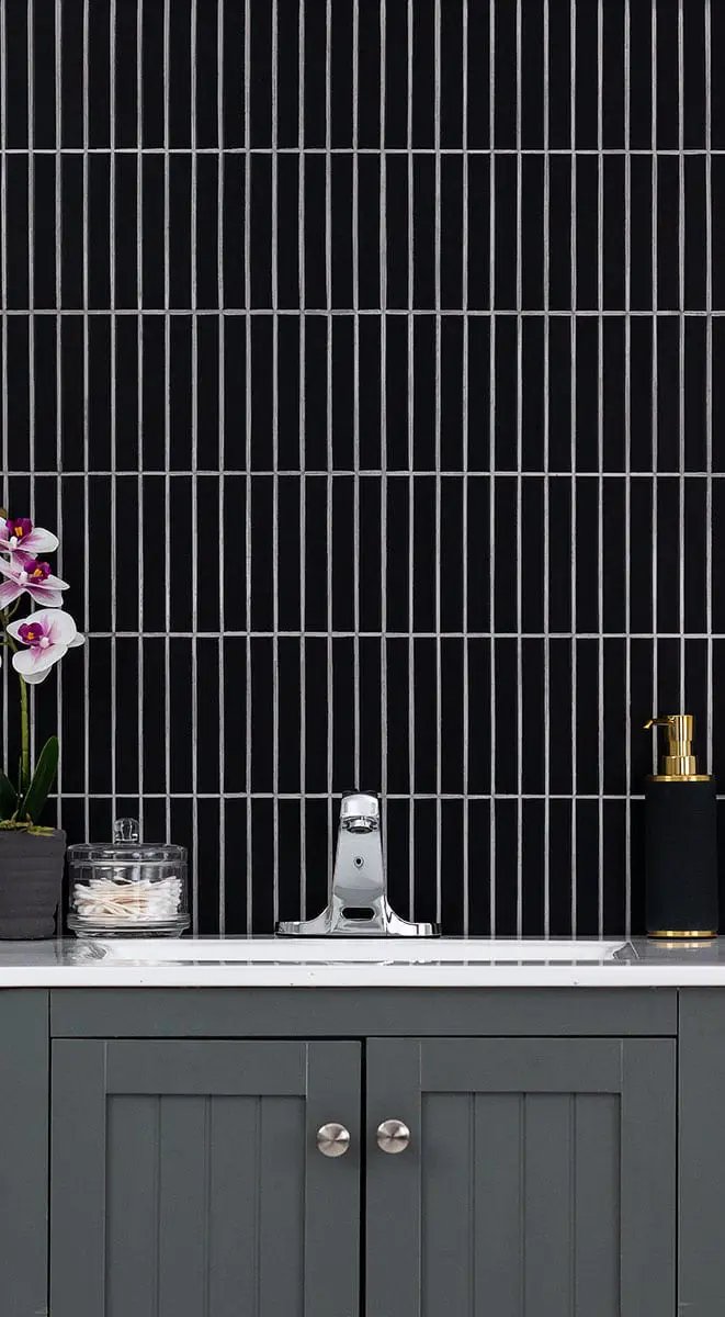 Black Matte 1x6 Stack Pattern Porcelain Mosaics in a finished room