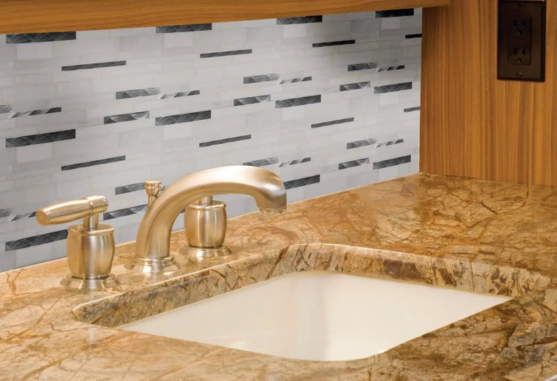 Moderno Blanco Interlocking 12x18 Pattern 8mm Metal Mosaics in a finished room
