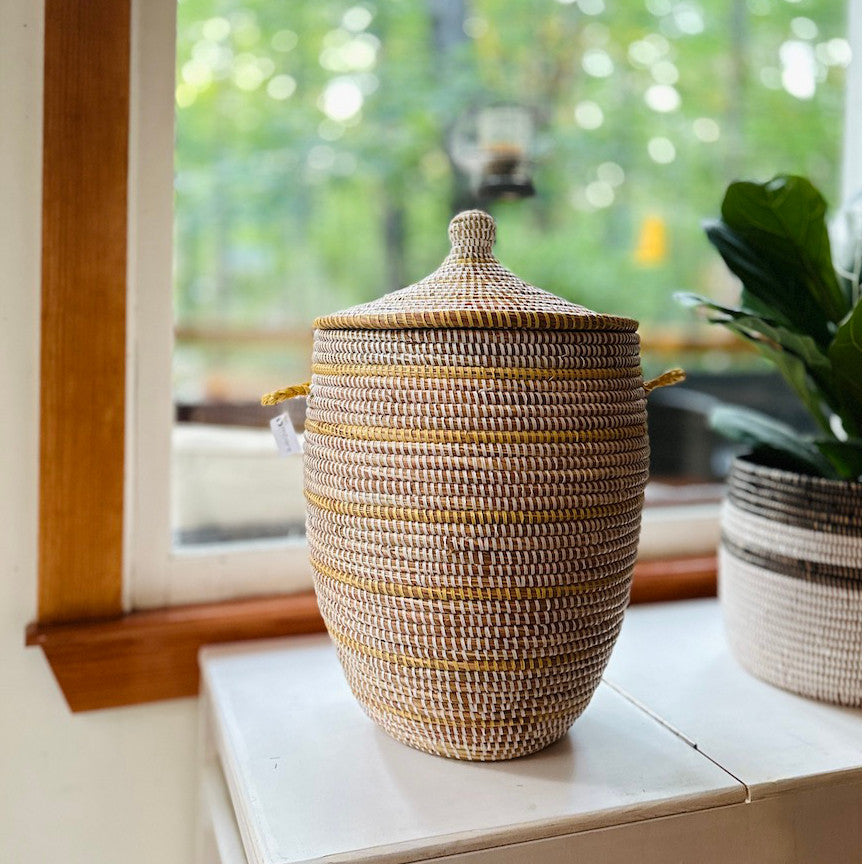 Striped White + Ivory Medium Basket, installed in a room