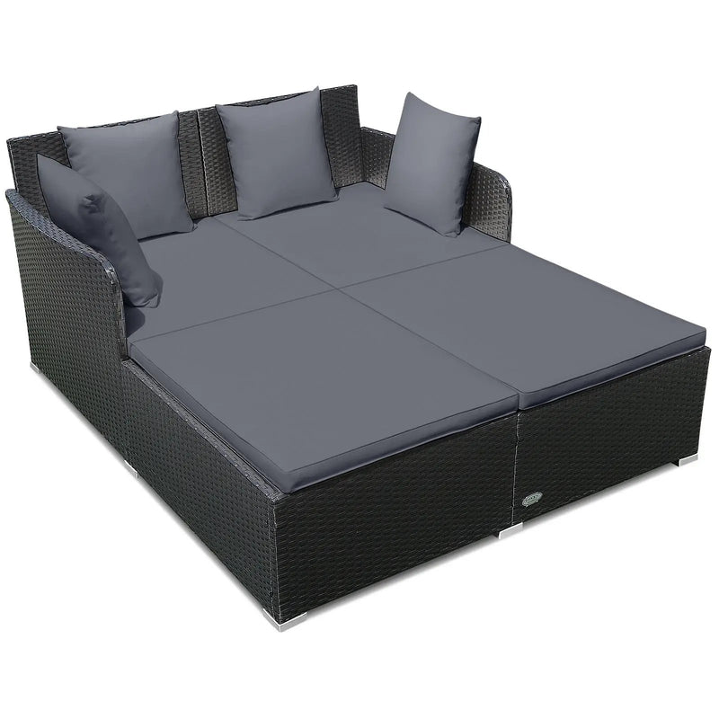 Spacious Outdoor Rattan Daybed with Upholstered Cushions and Pillows by DirectDeals