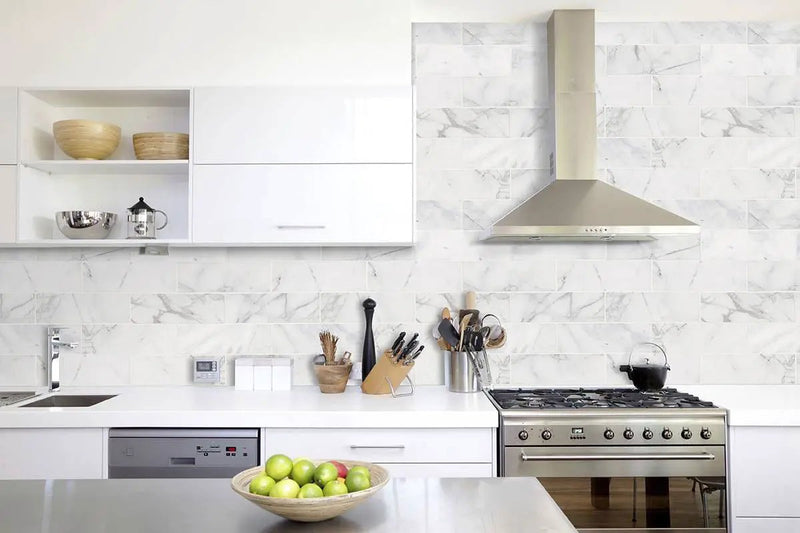 Calacatta Cressa Marble Subway Tile 4x12 Honed Mosaics in a finished room