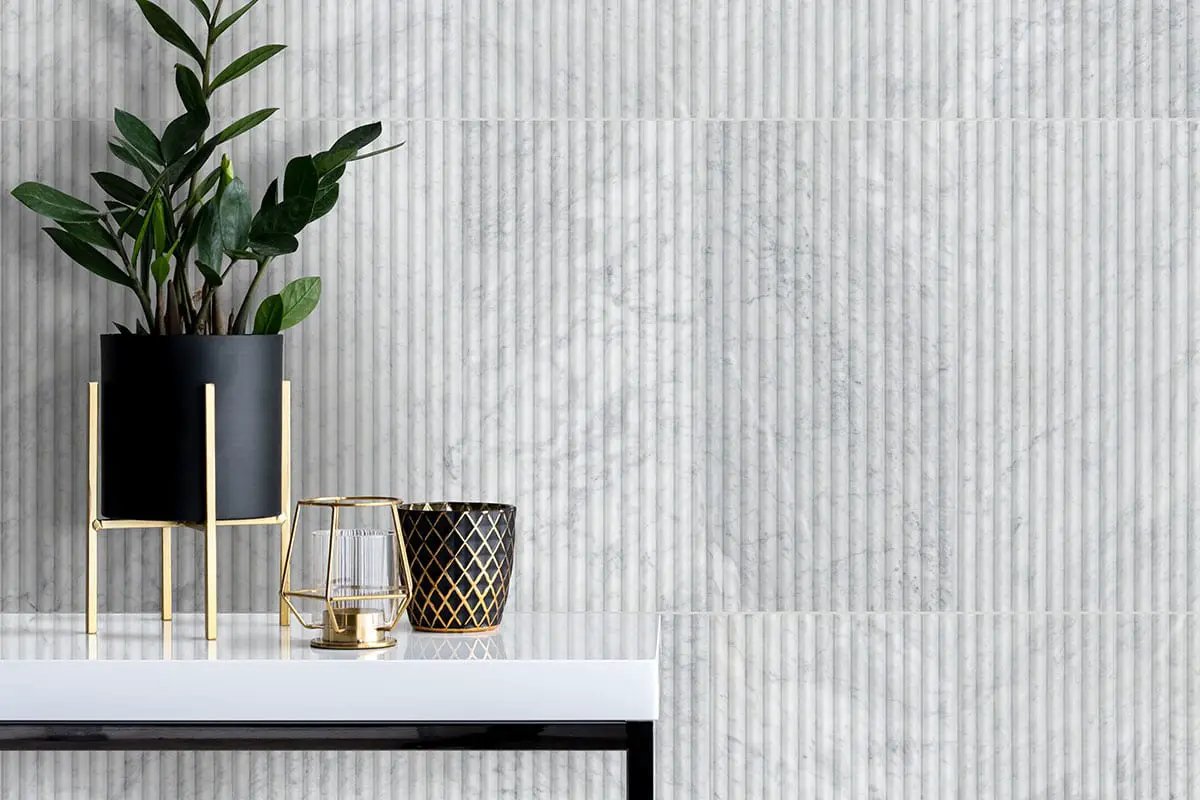 Carrara White Milano Ribbo 12x24 Honed Marble Mosaics in a finished room