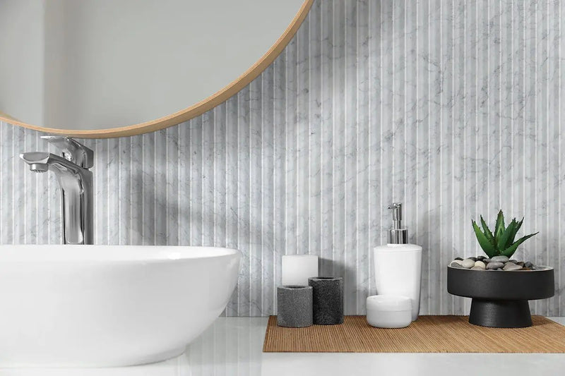 Carrara White Valentino Fluto 12x24 Honed Marble Mosaics in a finished room
