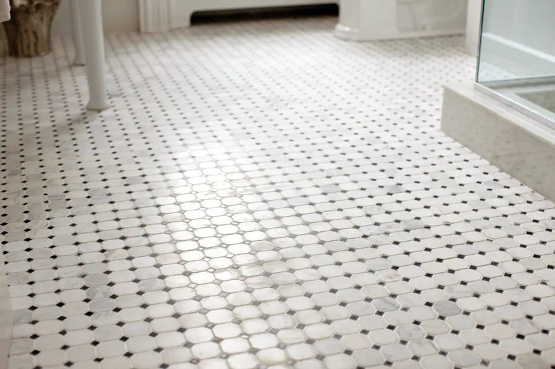 Greecian White 2" Octagon With Black 5/8x5/8 Polished In 12x12 Mesh Marble Mosaics in a finished room