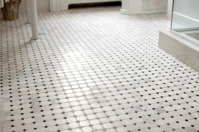 Greecian White 2" Octagon With Black 5/8x5/8 Polished In 12x12 Mesh Marble Mosaics in a finished room