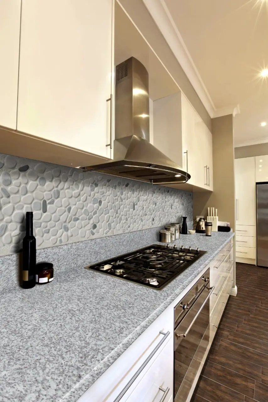 Black And White Pebbled Tumbled Pattern Marble Mosaics in a finished room