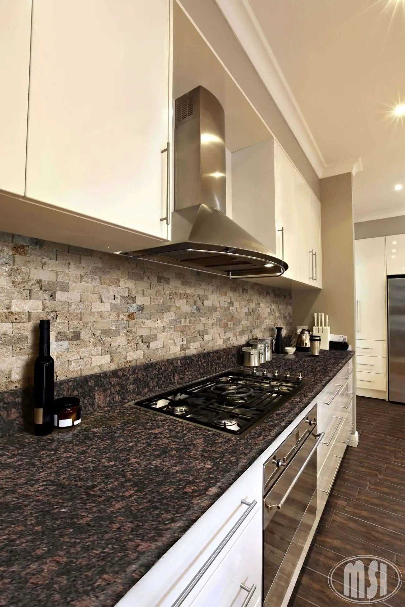 Tan Brown Polished Granite Tiles 12x12 in a finished room