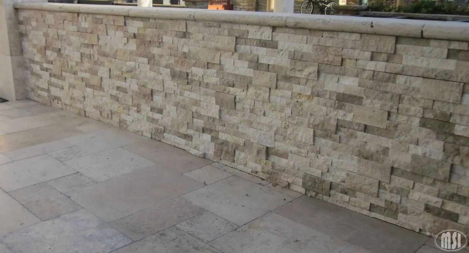 Tuscany Ivory Tumbled Pattern Travertine Pavers in a finished room