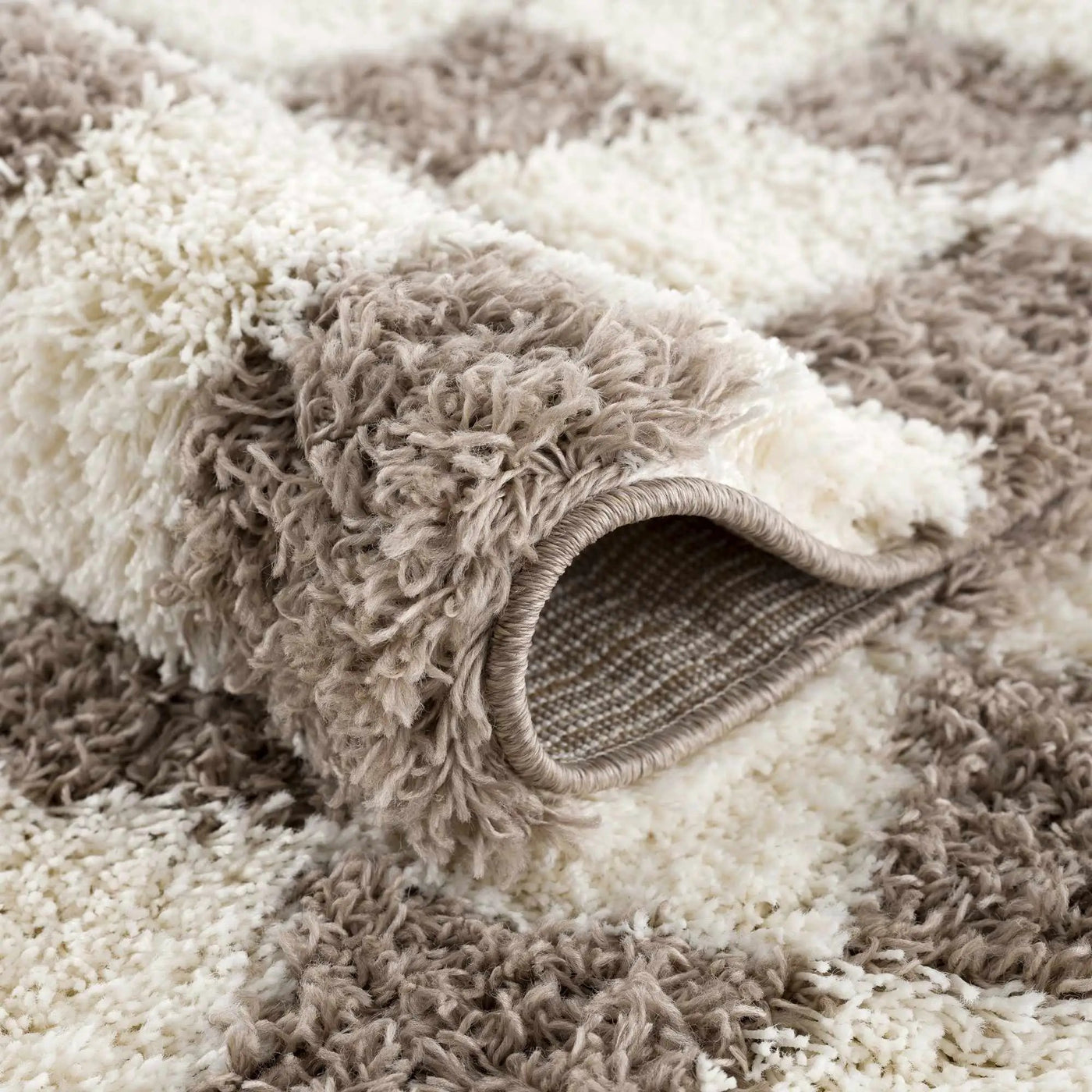 Atira Brown Checkered Area Rug by Boutique Rugs