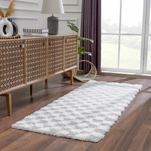 Atira Gray Checkered Area Rug, installed in a room 2