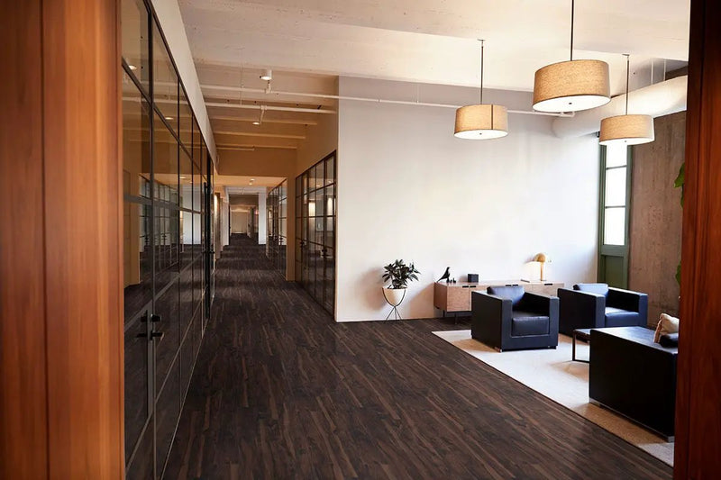 Glenridge Burnished Acacia Semi Gloss End Cap Wood Look Lvt Moldings 1.5x0.25 in a finished room