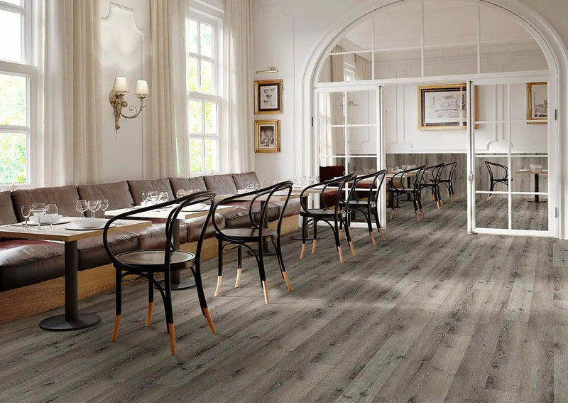 Glenridge Charcoal Oak Semi Gloss Quarter Round Wood Look Lvt Moldings 0.64x0.75 in a finished room