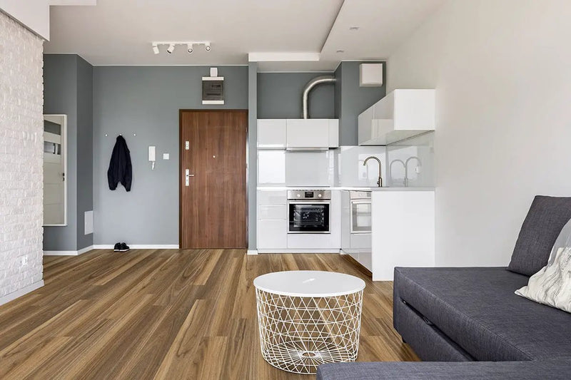 Glenridge Tawny Birch Semi Gloss Quarter Round Wood Look Lvt Moldings 0.64x0.75 in a finished room
