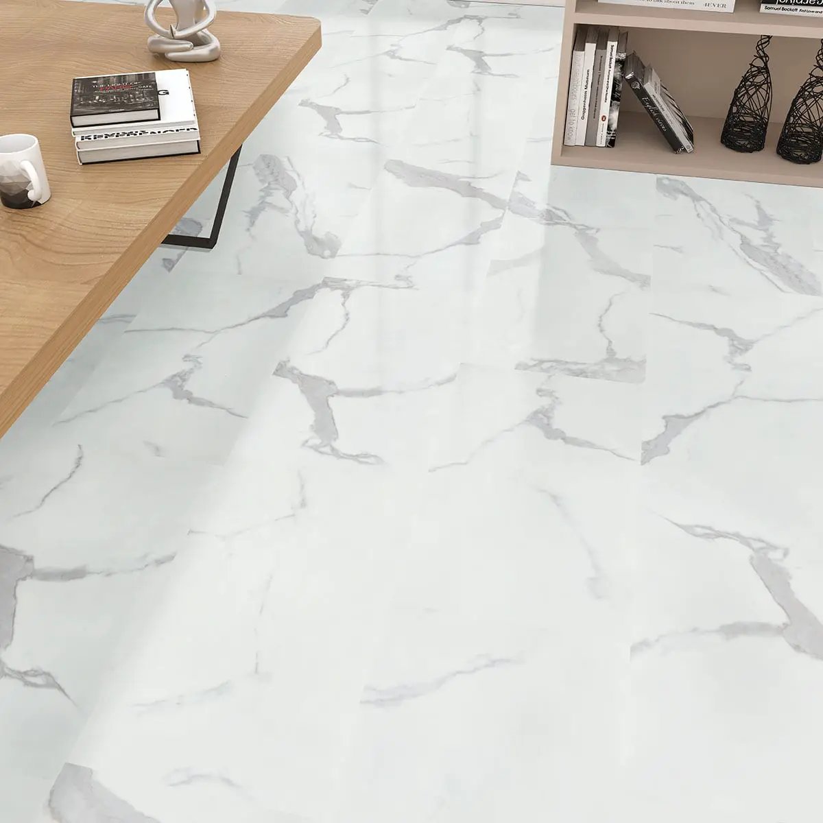 Trecento Calacatta Marbello Semi Gloss Overlap Stair Nose Lvt Moldings 2.23x1.03 in a finished room