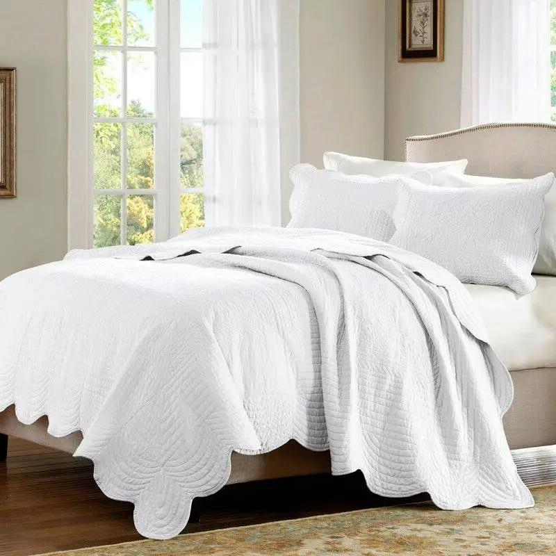 King Size 3 Piece Reversible Scalloped Edges Microfiber Quilt Set in White by HomePacific