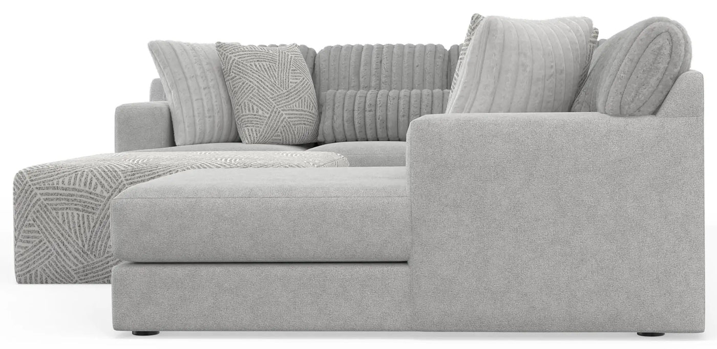 Logan - Upholstered Sectional With Comfort Coil Seating - 46" Cocktail Ottoman And Accent Pillows Included by Unique Piece Furniture
