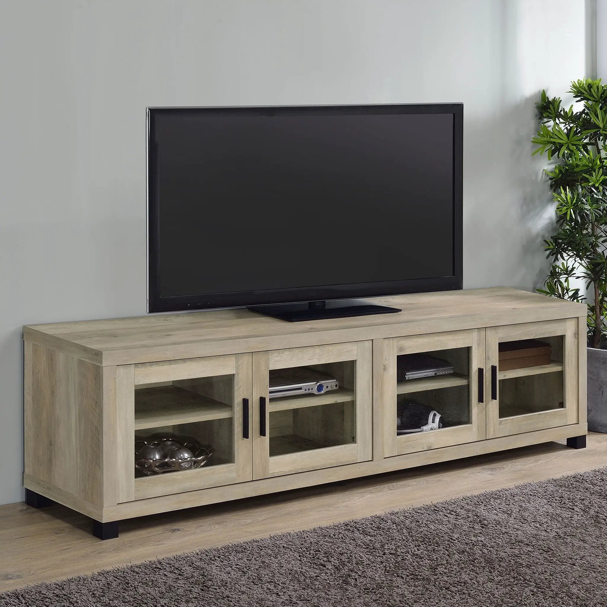 Sachin 4-door Engineered Wood 79-inch TV Stand Distressed Pine by Unique Piece Furniture