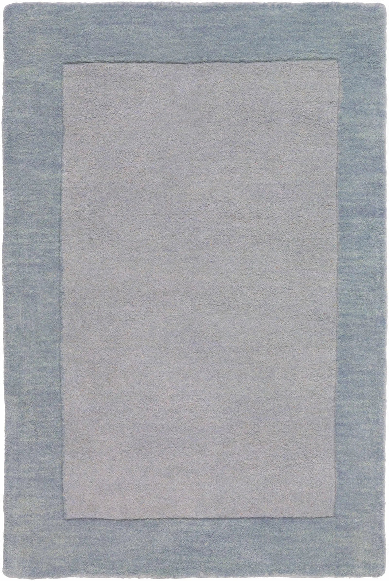 Arkabutla Solid Blue Bordered Wool Rug by Boutique Rugs