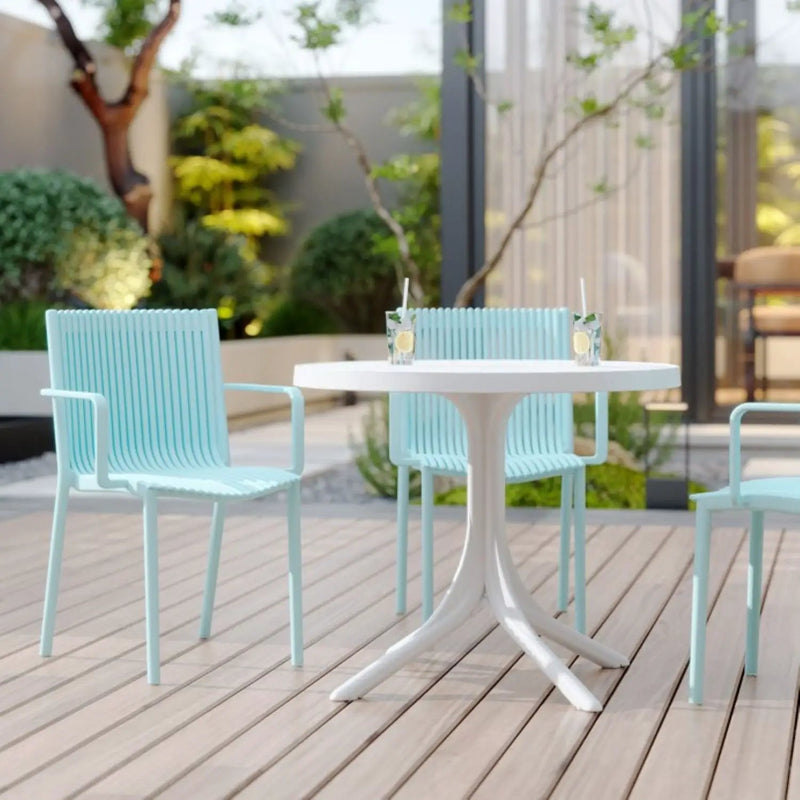4 Modern Stackable Plastic Armchair Matched With Round Table by Unique Piece Furniture