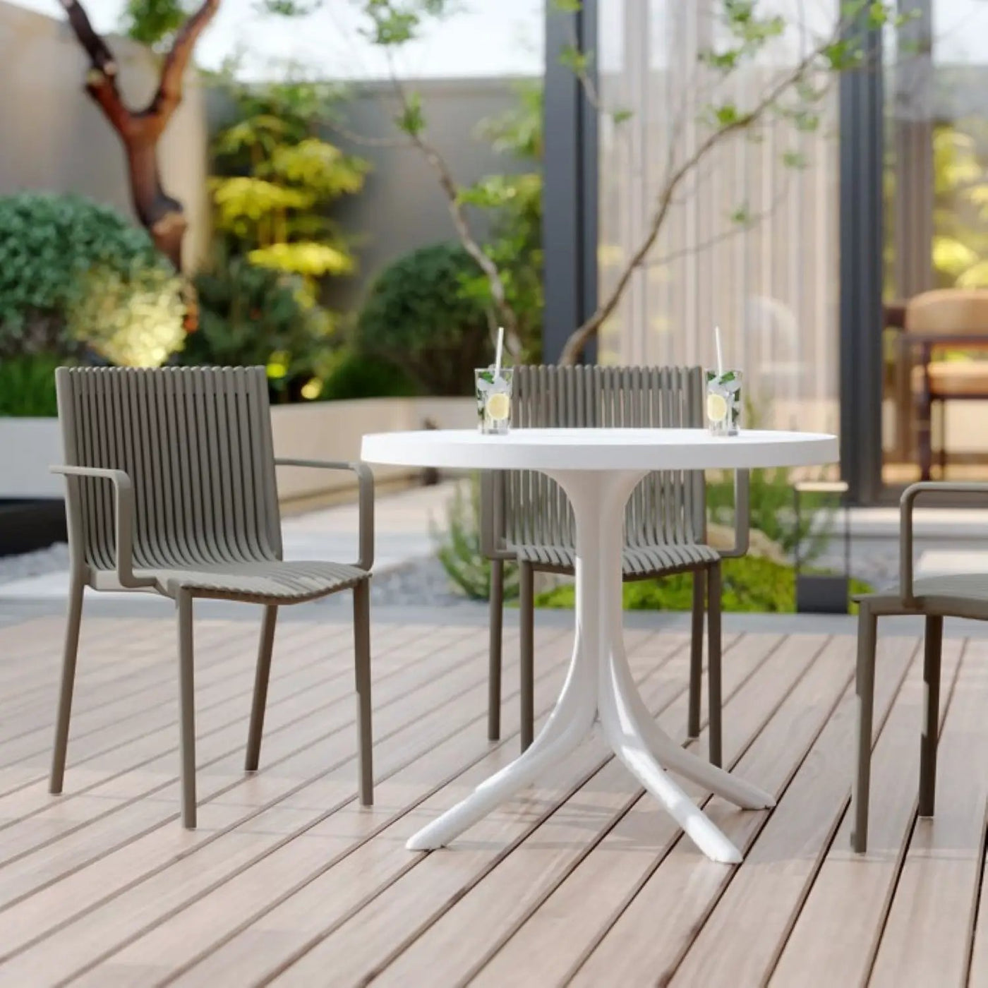 4 Modern Stackable Plastic Armchair Matched With Round Table by HouseOfZazla