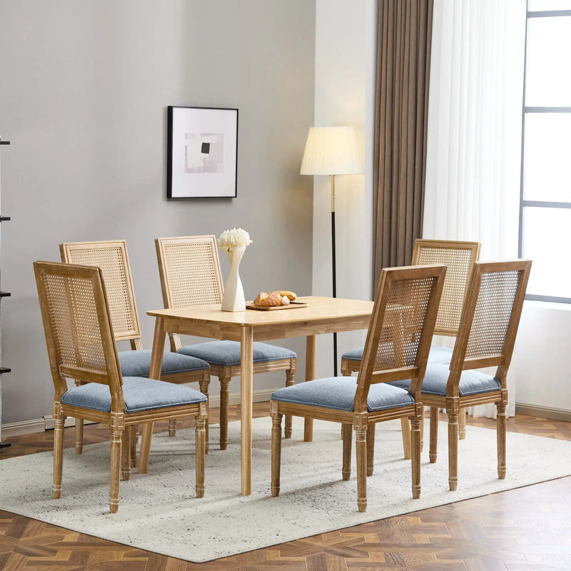 French Country Dining Chair With Rectangular Cane Backrest And Smooth Upholstered Seating by HouseOfZazla