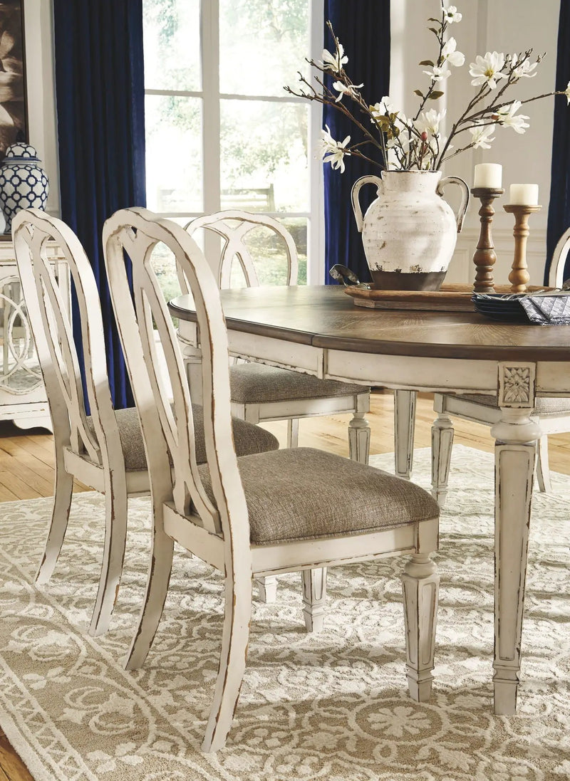 Realyn - Oval Dining Table Set by Unique Piece Furniture