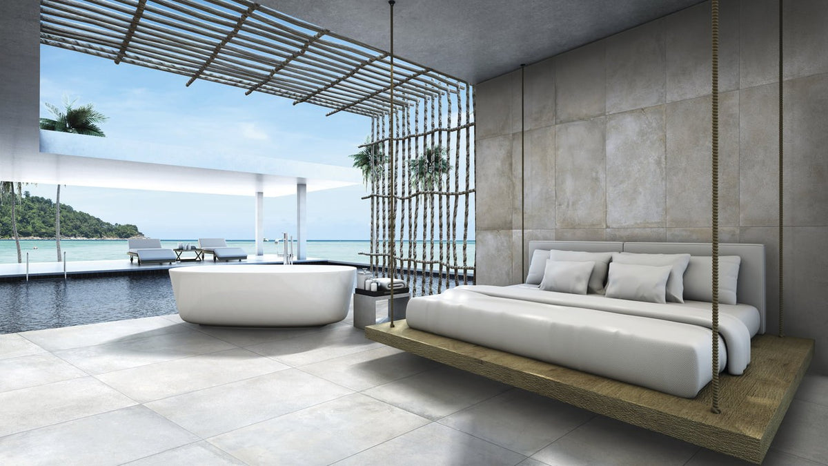 Brooklyn Cemento Argent Honed Concrete Look Porcelain Tiles 24x48 installed in a bedroom