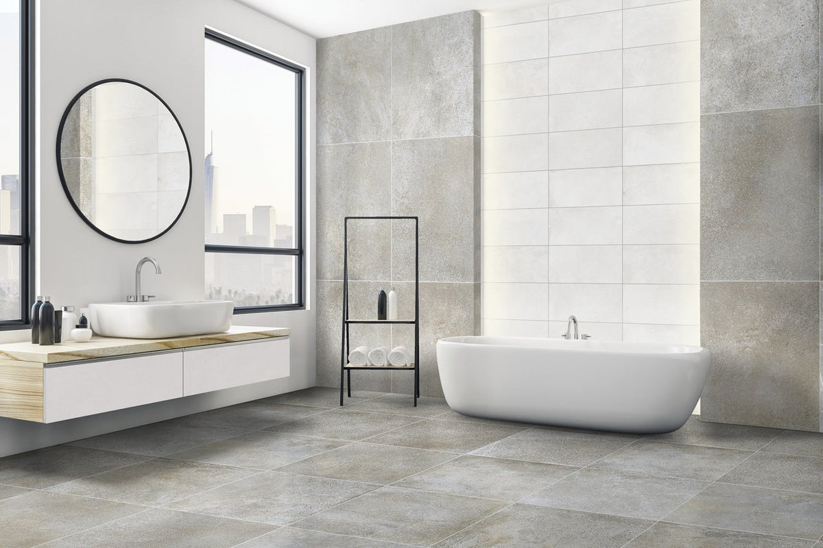 Brooklyn Cemento Greige Honed Concrete Look Cove Base Porcelain Trim 6x12 installed in a bathroom