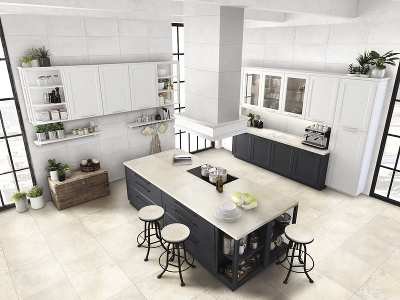 Brooklyn Cemento Sand Honed Concrete Look Cove Base Porcelain Trim 6x12 installed in a kitchen