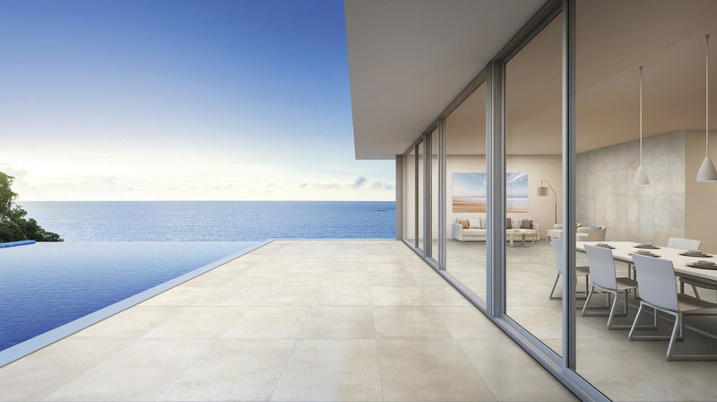Brooklyn Cemento Sand Honed Concrete Look Porcelain Tiles 24x48 installed in a pool area
