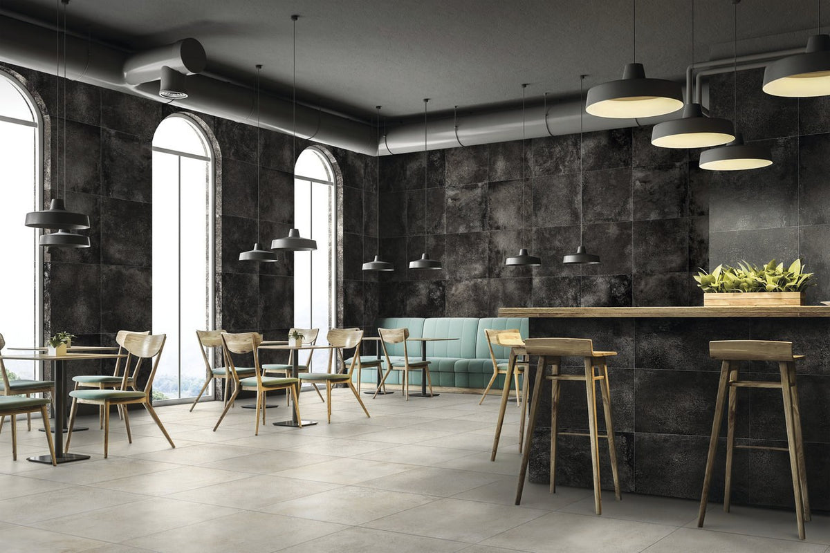 Brooklyn Cemento Sand Honed Concrete Look Porcelain Tiles 24x48 installed in a cafe