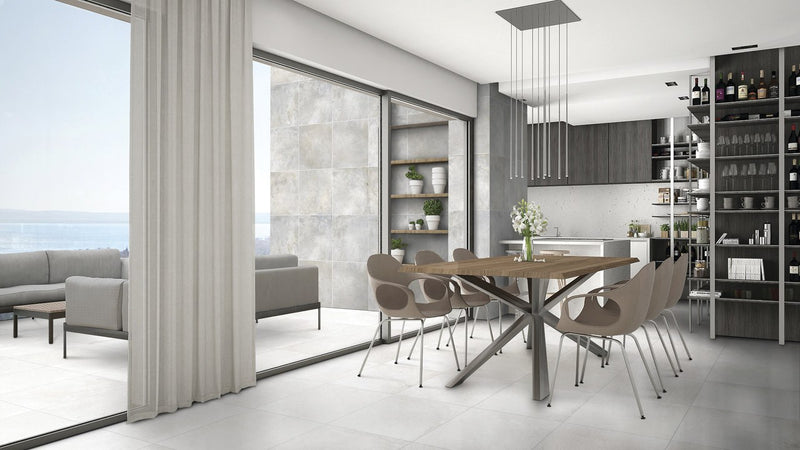 Brooklyn Cemento White Honed Concrete Look Bullnose Porcelain Trim 4x24 installed in a dining room