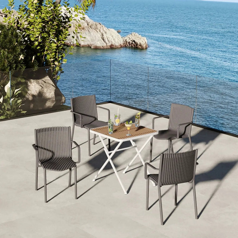 4 Modern Stackable Plastic Armchair Matched With Folding Square Table by Unique Piece Furniture