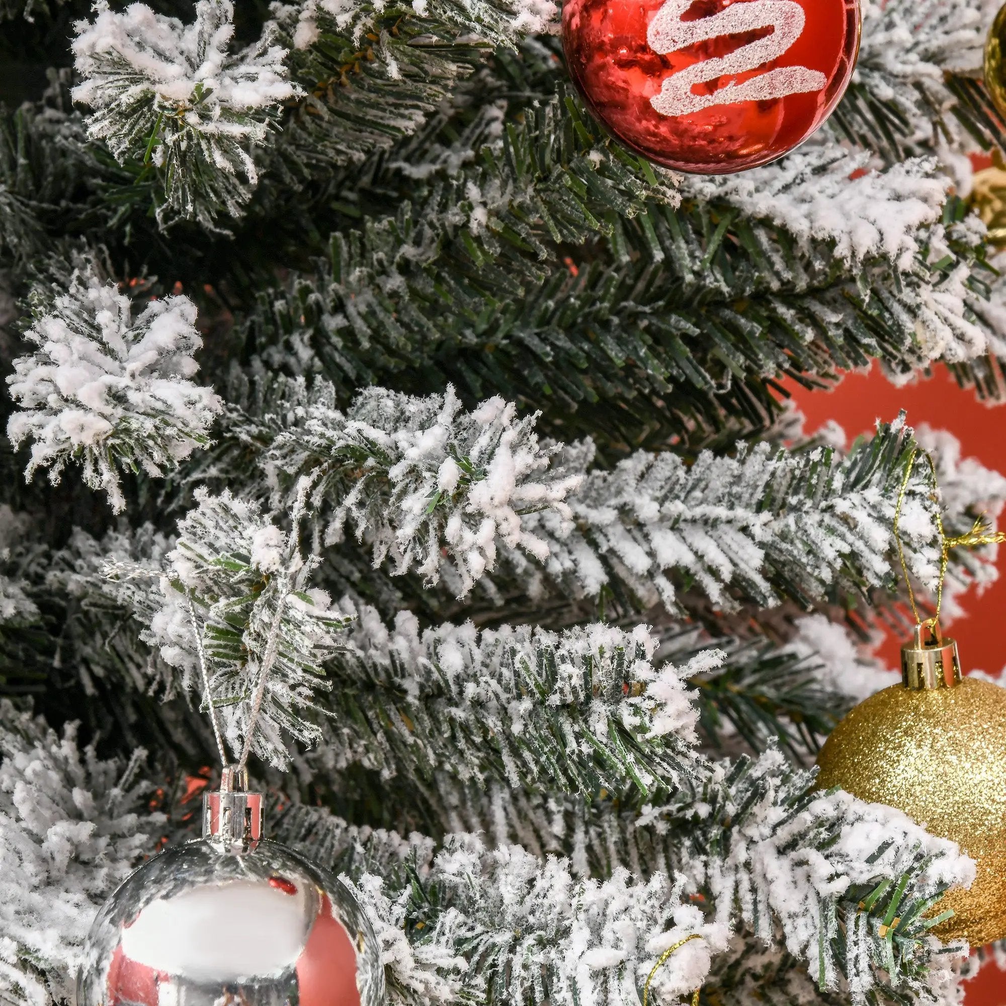 9ft Flocked Christmas Tree with Faux Snow by HouseOfZazla