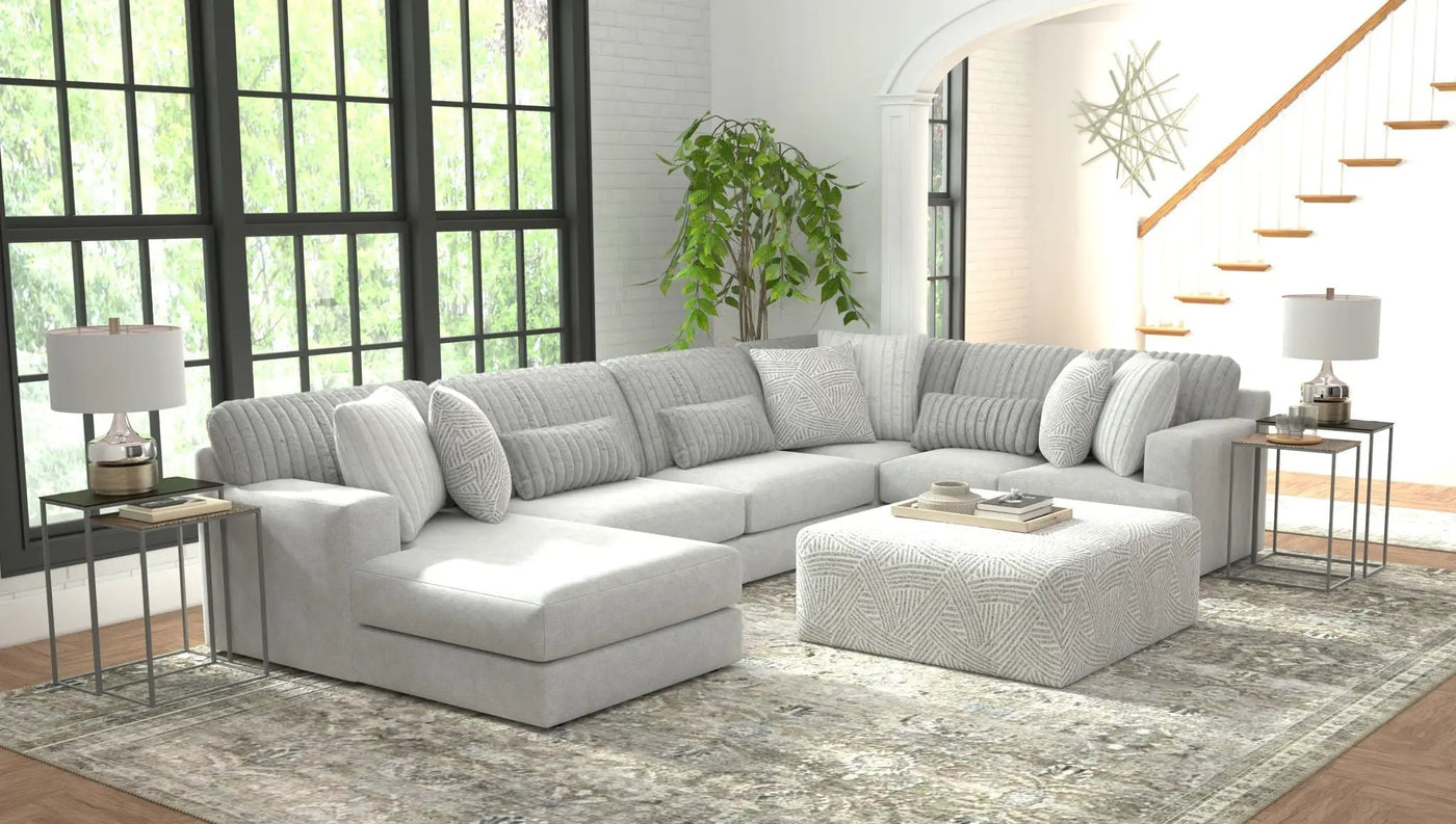 Logan - Upholstered Sectional With Comfort Coil Seating - 46" Cocktail Ottoman And Accent Pillows Included by Unique Piece Furniture