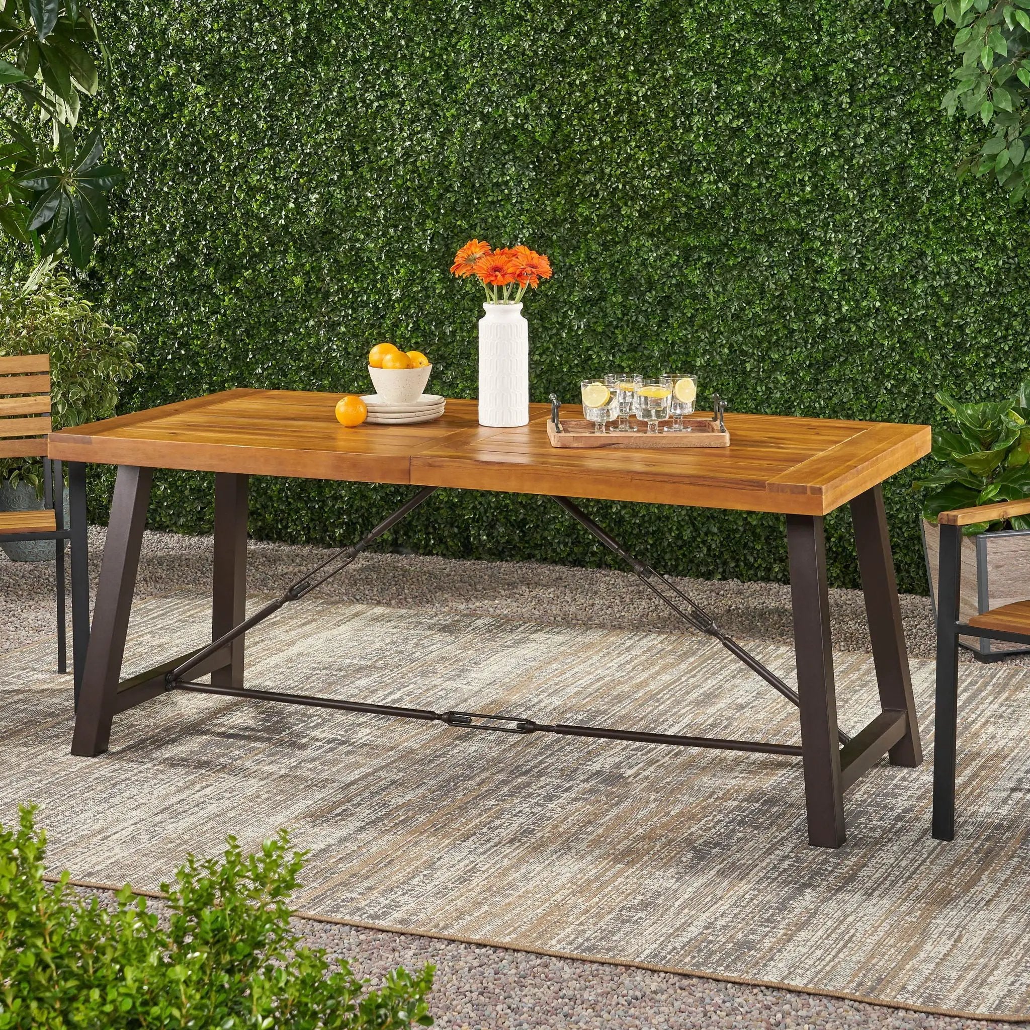 Outdoor Dining Table With Slat Wooden Panel And Turnbuckle Accents - Teak by HouseOfZazla
