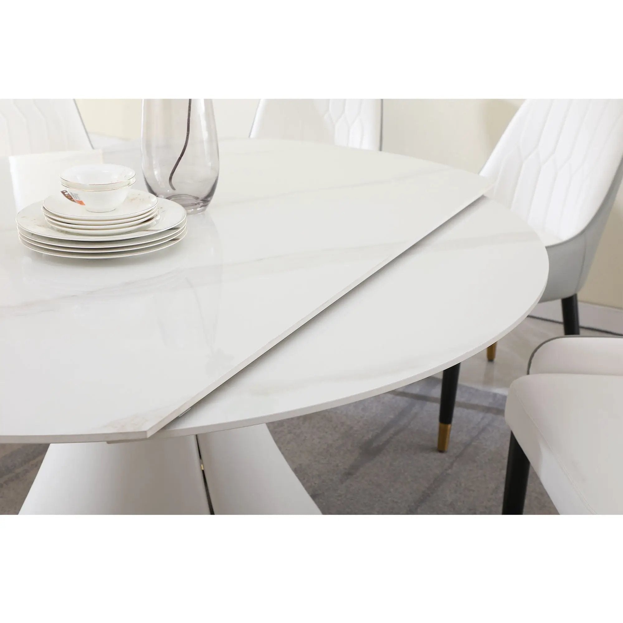 Fashion Modern Sintered Stone Dining Table With Retractable Function And Chairs by HouseOfZazla
