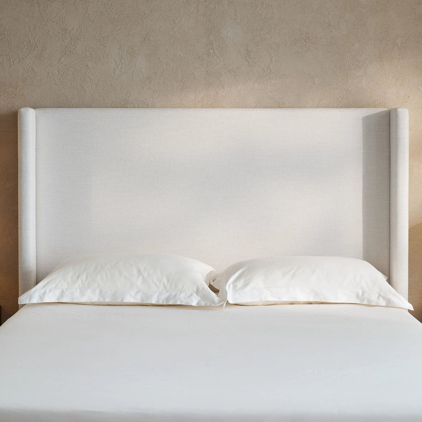 Hosford - Minimalist Upholstered Wingback Bed by HouseOfZazla