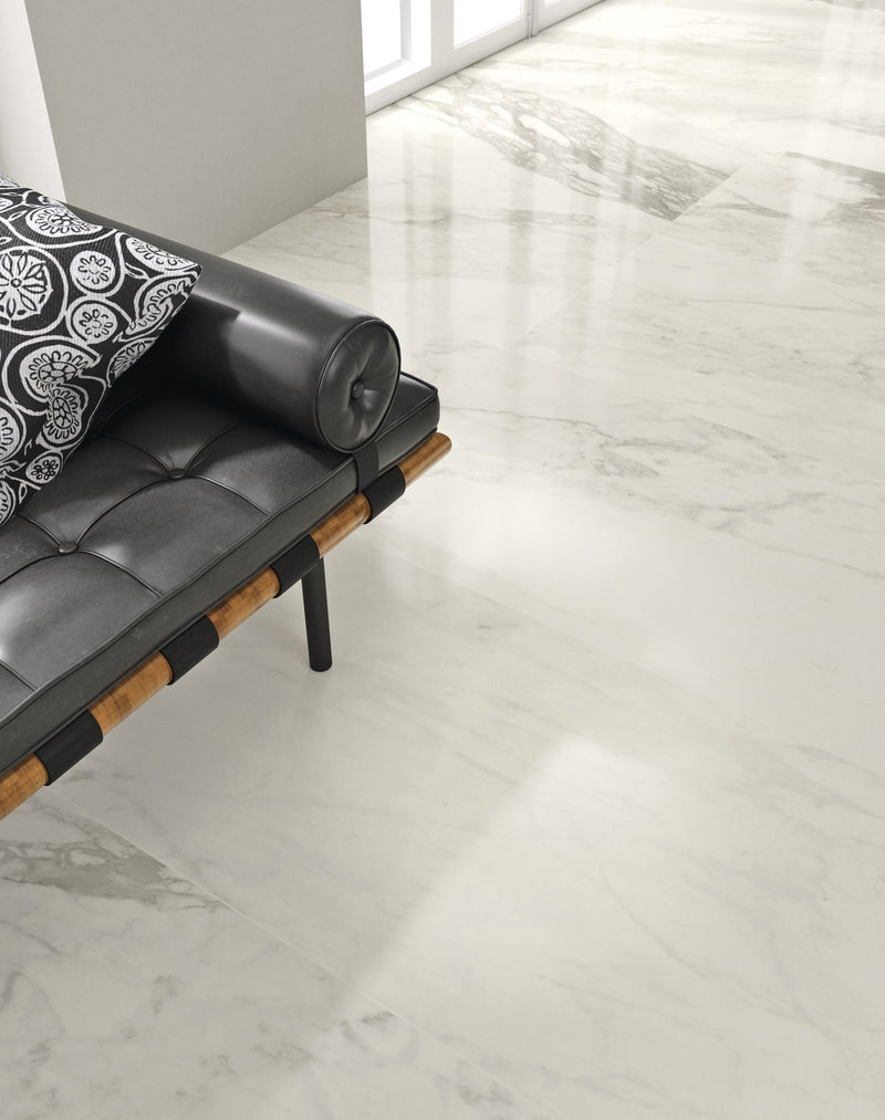 Carrara Select 2.0 Calacatta Renoire Honed Marble Look Bullnose Porcelain Trim 4x24 installed in a living room, view 4