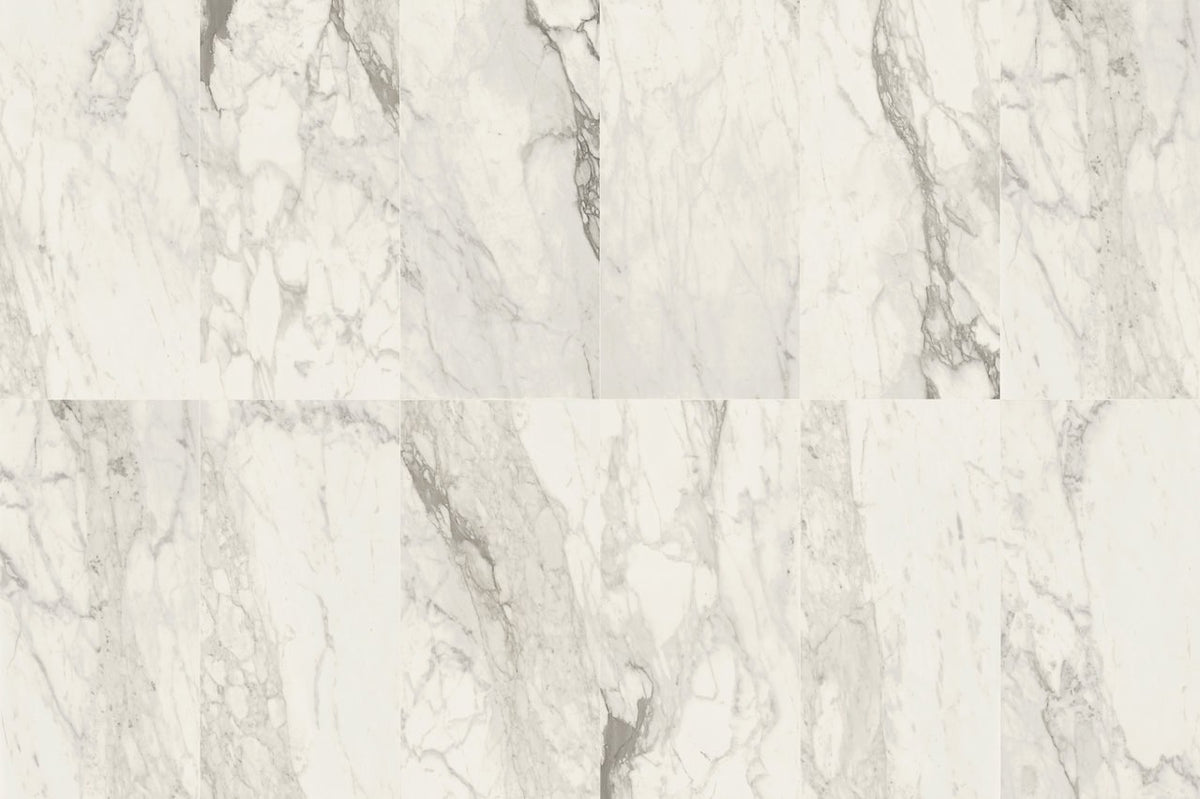 Carrara Select 2.0 Calacatta Renoire Honed Marble Look Cove Base Porcelain Trim 6x12, several pieces laid together