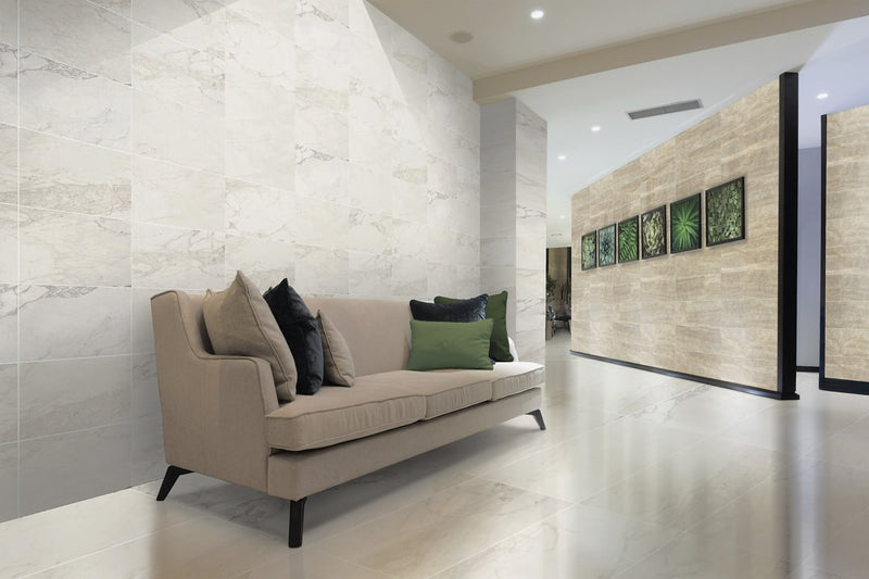 Carrara Select 2.0 Calacatta Renoire Honed Marble Look Cove Base Porcelain Trim 6x12 installed in a living room, view 2