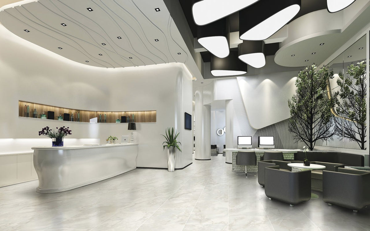 Carrara Select 2.0 Onyx Grey Honed Marble Look Bullnose Porcelain Trim 4x24 installed in a lobby