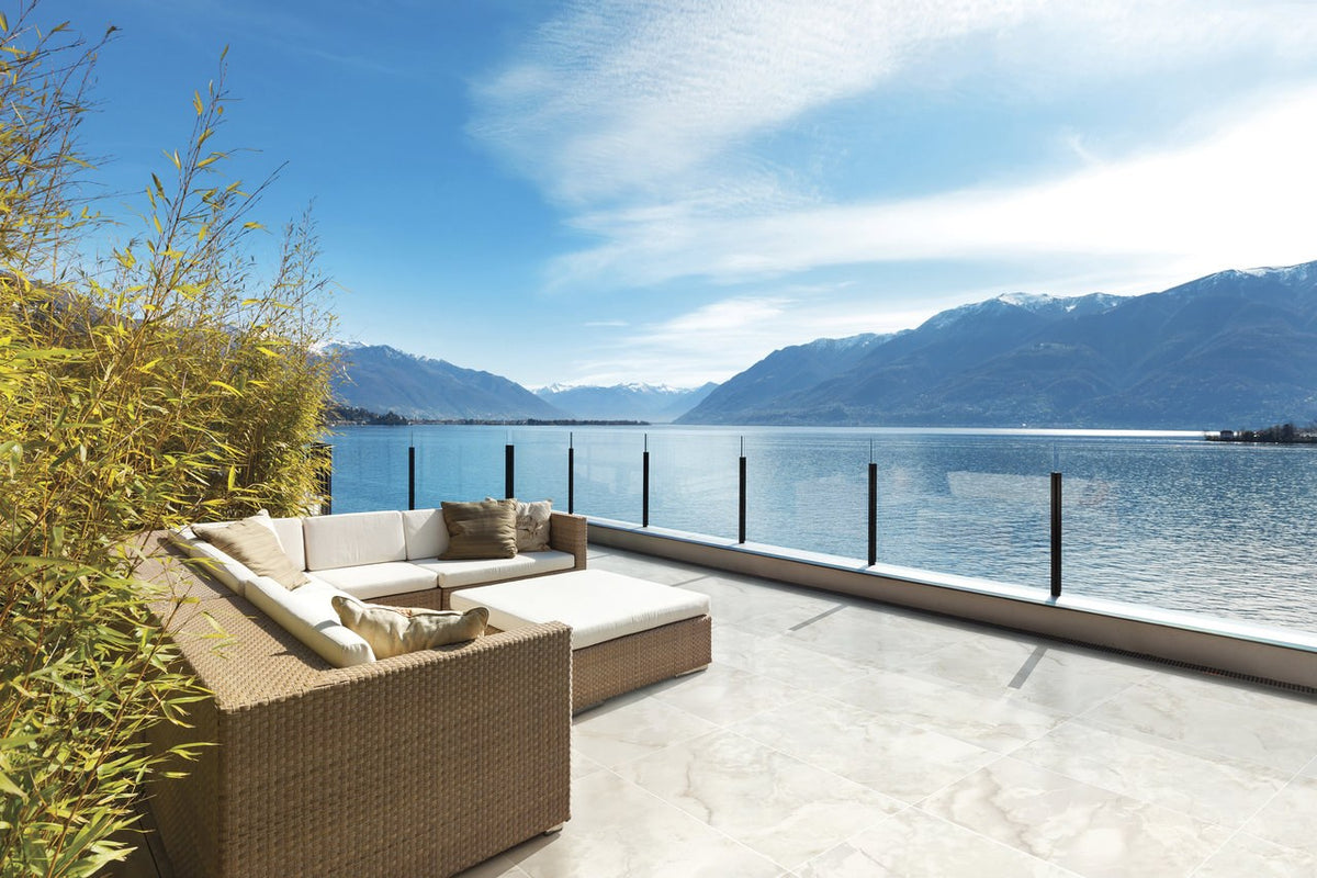 Carrara Select 2.0 Onyx Grey Honed Marble Look Cove Base Porcelain Trim 6x12 installed in a patio