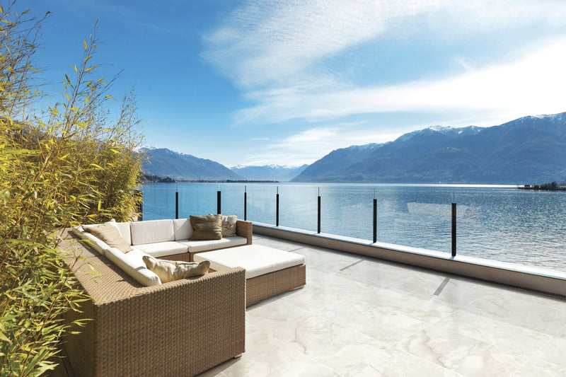 Carrara Select 2.0 Onyx Grey Honed Marble Look Cove Base Porcelain Trim 6x12 installed in a patio