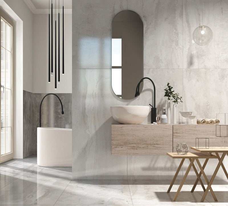 Carrara Select 2.0 Romano Greige Honed Marble Look Bullnose Porcelain Trim 4x24 installed in a bathroom