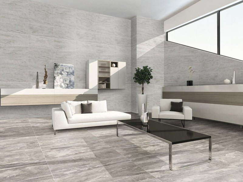 Carrara Select 2.0 Romano Greige Honed Marble Look Bullnose Porcelain Trim 4x24 installed in a living room