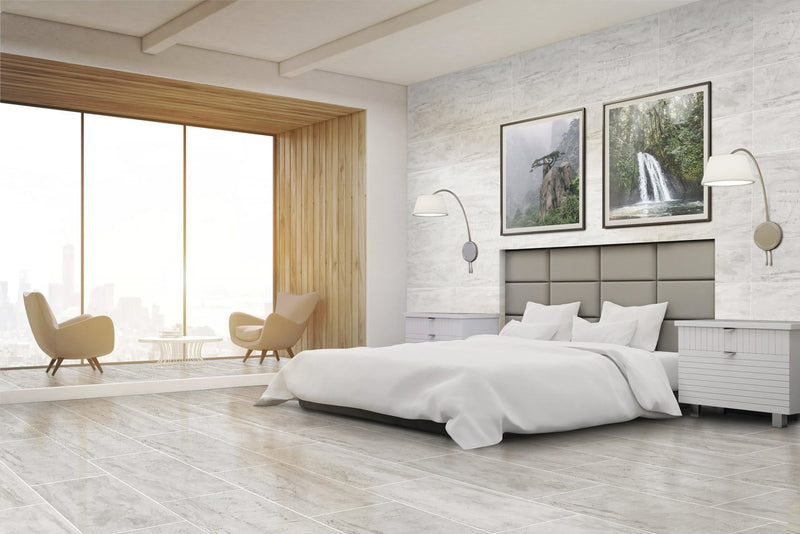 Carrara Select 2.0 Romano White Honed Marble Look Cove Base Porcelain Trim 6x12 installed in a bedroom