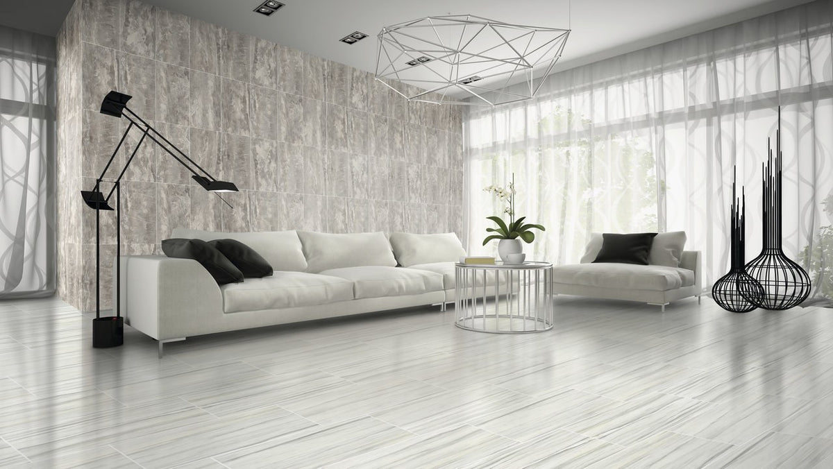 Carrara Select 2.0 Zebrino Honed Marble Look Bullnose Porcelain Trim 4x24 installed in a living room